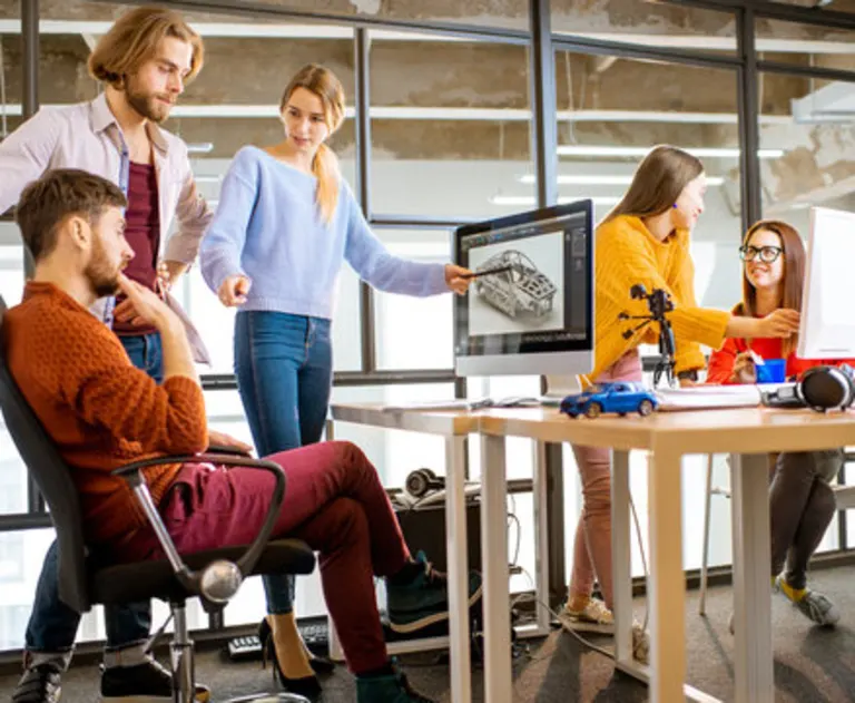 Team of workers in a 3d modelng lab