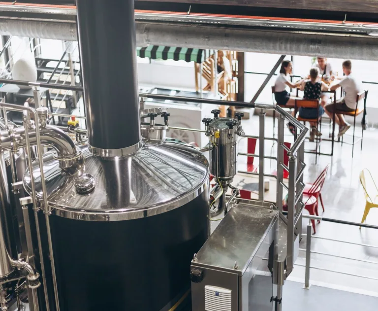 This image shows the inside of a commercial brewing factory.