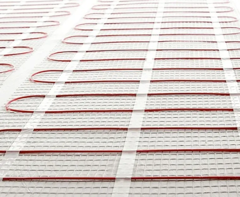 The image shows an electric radiant underfloor heating mat, commonly used for warming driveways.