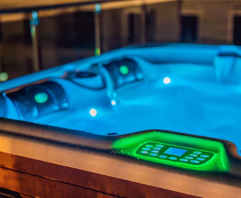 This is a modern hot tub, likely featuring advanced features such as energy-efficient pumps and customizable lighting. Many models utilize vibrant, color-changing LED lighting for ambiance. They are equipped with various jet arrangements designed for targeted neck, shoulder, or back massage therapy. Modern tubs may include automated water care systems to reduce manual maintenance needs.
