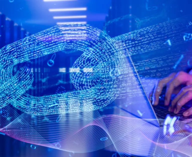 This image illustrates the concept of cybersecurity and blockchain technology, emphasizing data protection and digital infrastructure. It features a glowing chain overlaying binary code, symbolizing secure, interconnected data blocks. The background shows a data center or server room, representing the physical infrastructure of cloud storage. A person is shown typing on a laptop, indicating active management or monitoring of these digital system.