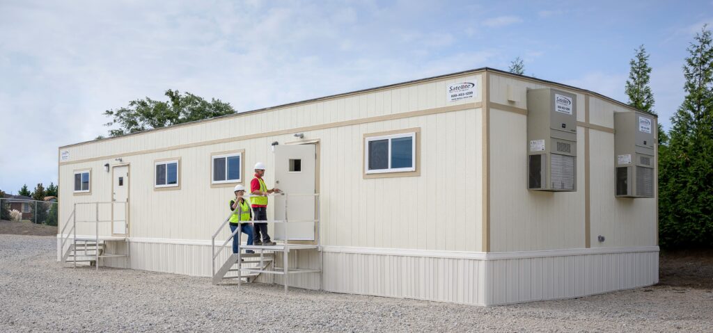 This is a mobile office trailer, designed for temporary use on construction job sites or other commercial applications.