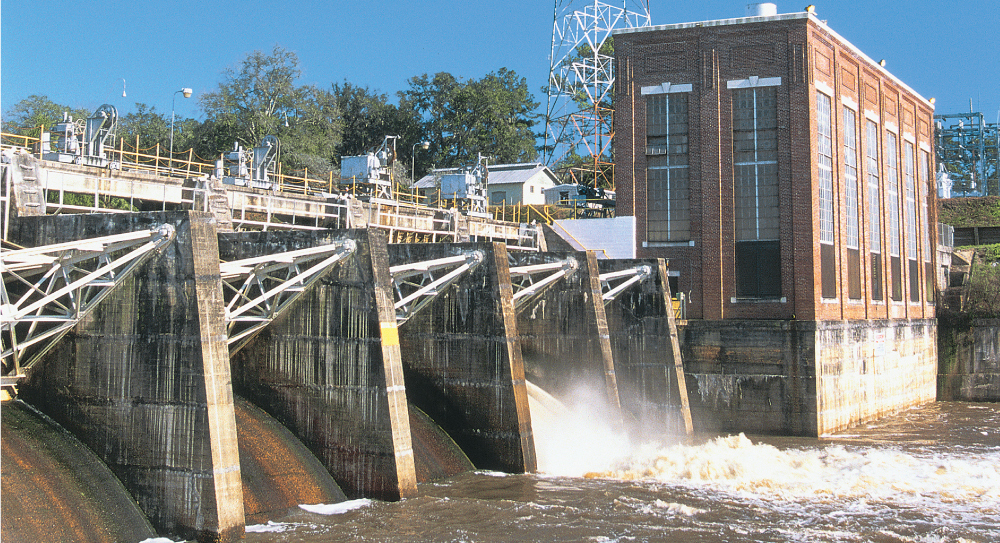 The image shows the Jackson Bluff Dam and the C.H. Corn Hydroelectric Generating Station located in Leon County, Florida.