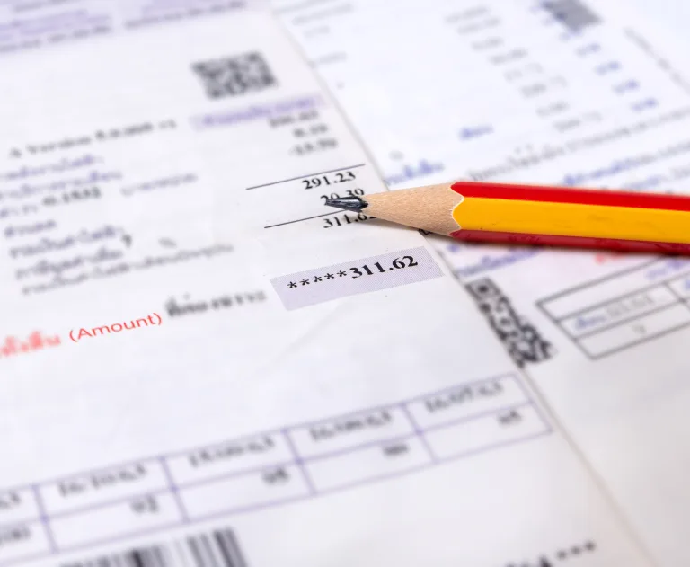 This image shows a close up of a utility or electric bill.