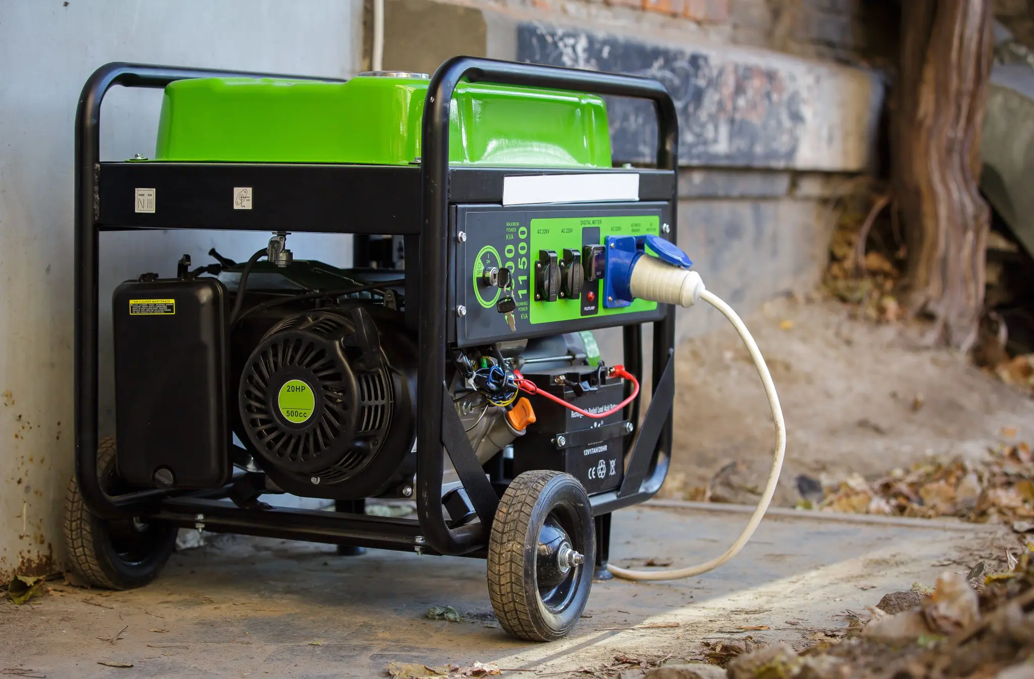 This is a portable gasoline generator with a green fuel tank.