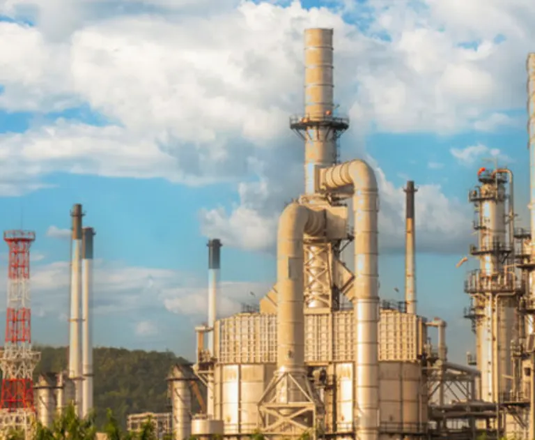 This image depicts an industrial petroleum processing plant or oil refinery.