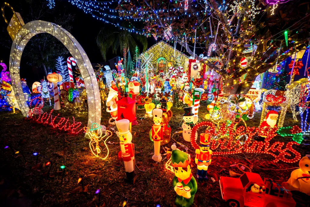 This image shows a house decorated with holiday lights in Florida.