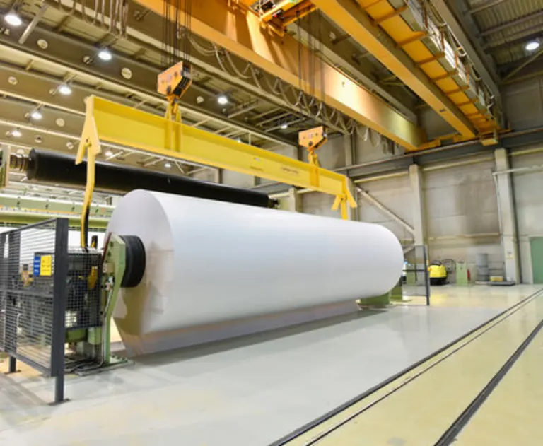 This image shows a large-scale industrial paper manufacturing facility.