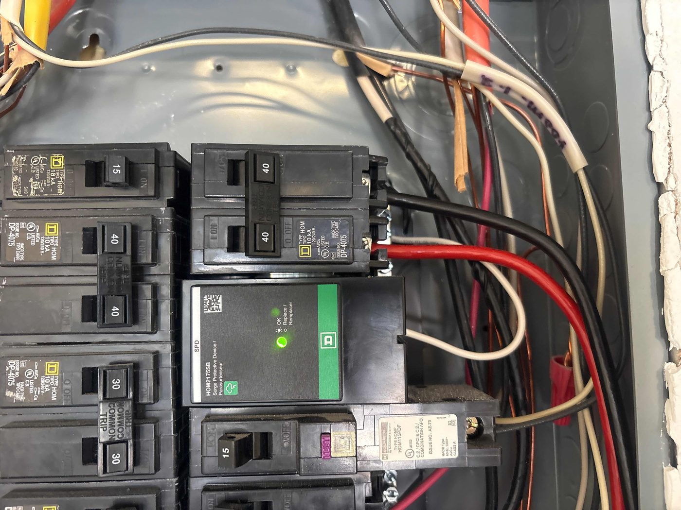 Whole house surge protector installed in a residential electrical panel