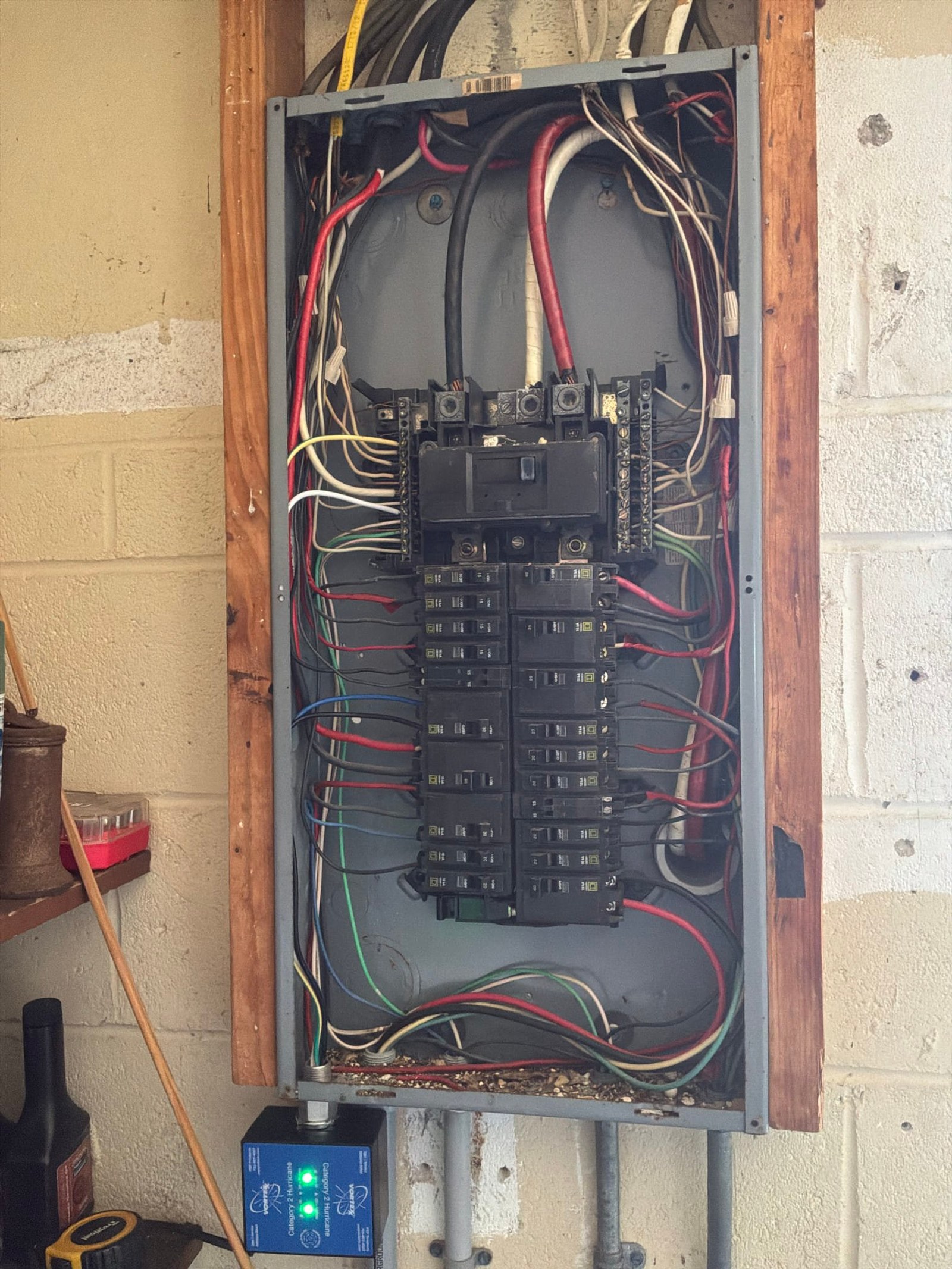 The inside of an electrical panel documented before the work on a Panel Service/Repair job in Jupiter, FL.