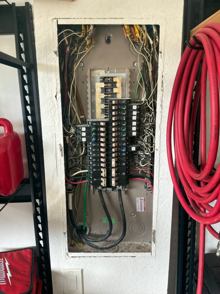 Electrical panel documented on an Electric Fixture Service/Repair job in Stuart, FL.