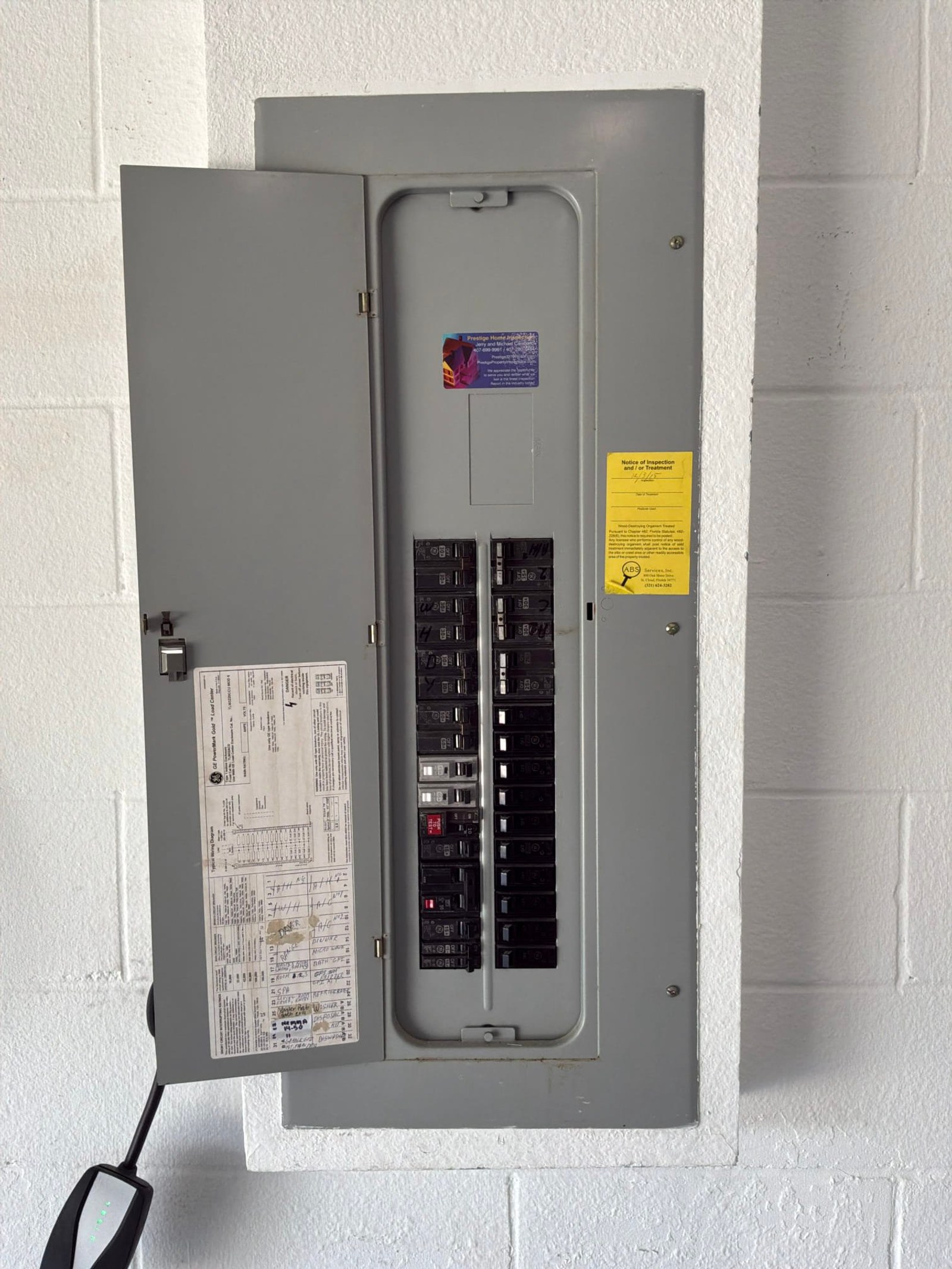 The electrical panel with its dead front in place documented before the work on an Electric Fixture Service/Repair job in Winter Garden, FL.