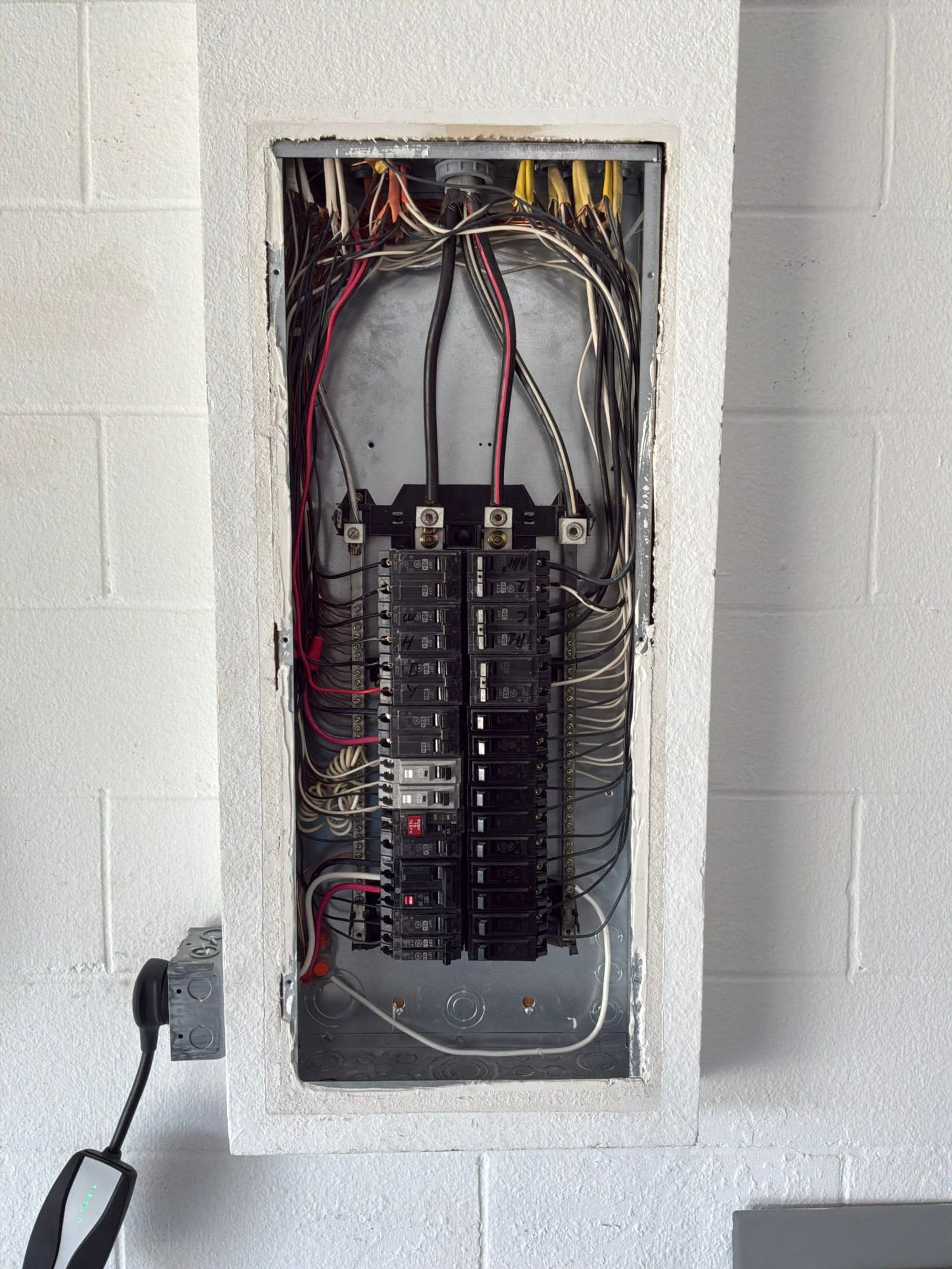 The inside of an electrical panel documented during the work on an Electric Fixture Service/Repair job in Winter Garden, FL.